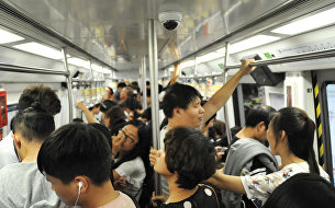 Пассажиры пекинского метро